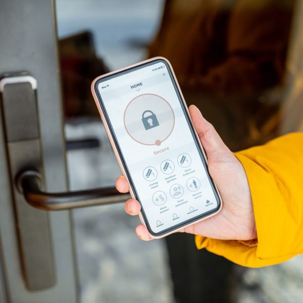 Locking entrance door with a smart phone