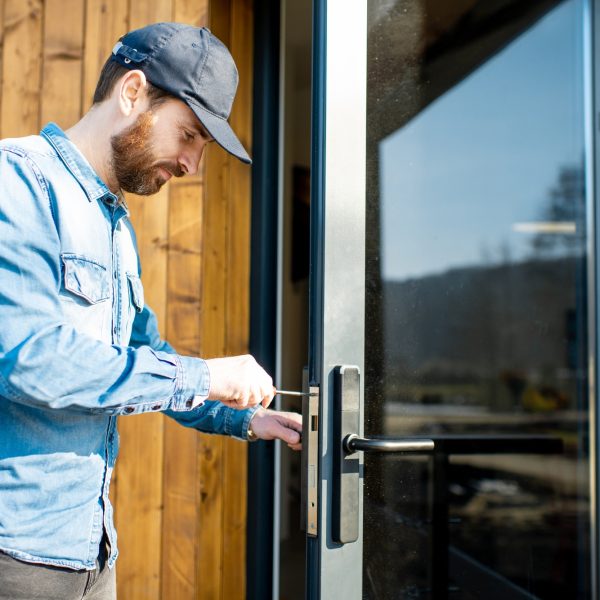 Man repairing door lock